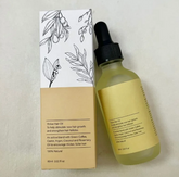 Moisturizing Repair Hair Care Essential Oil bottle with natural ingredients for healthy hair growth and shine.