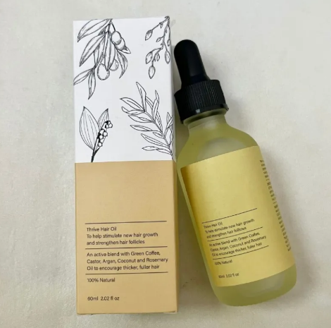 Moisturizing Repair Hair Care Essential Oil bottle with natural ingredients for healthy hair growth and shine.